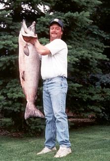 Alaska fishing at its best!  Joe with his 75 lb. Alaska king salmon fish caught on the famous Kenai River.  Way to go Joe!